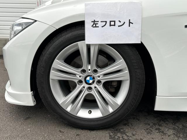 ３シリーズ ３２０ｉ　スポーツ　サンルーフ　純正ナビ　Ｂカメラ　ＥＴＣ　クルコン　ＨＩＤヘッドライト　社外サスペンション　フロントスポイラー　スマートキー　スペアキー　障害物センサー　レーダー探知機　パワーシート（65枚目）