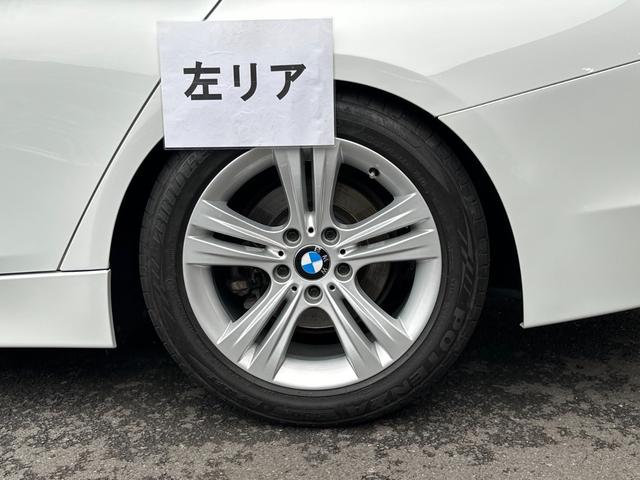 ３シリーズ ３２０ｉ　スポーツ　サンルーフ　純正ナビ　Ｂカメラ　ＥＴＣ　クルコン　ＨＩＤヘッドライト　社外サスペンション　フロントスポイラー　スマートキー　スペアキー　障害物センサー　レーダー探知機　パワーシート（67枚目）