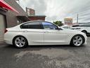 ３シリーズ ３２０ｉ　スポーツ　サンルーフ　純正ナビ　Ｂカメラ　ＥＴＣ　クルコン　ＨＩＤヘッドライト　社外サスペンション　フロントスポイラー　スマートキー　スペアキー　障害物センサー　レーダー探知機　パワーシート（6枚目）