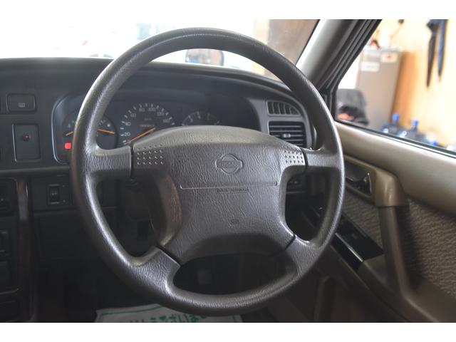 セドリック スーパーカスタム　車検令和９年８月２０日　キーレス　ボンネットマスコット　走行５６０００キロ　メッキフェンダーミラー　黄フォグ　エアフロメーター交換済み　スロットルボディ清掃　燃料ポンプ＆フィルター交換（9枚目）