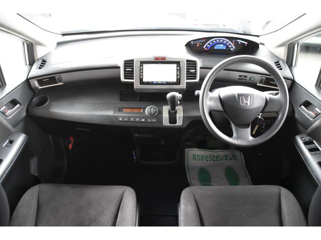 フリード Ｇ　ジャストセレクション　車検令和８年６月２１日　キーレス　ＥＴＣ　左パワスラ　純ＨＤＤナビ　地デジワンセグ　Ｂカメラ　ナビキャンセラー　オートライト　ウインカーミラー（8枚目）