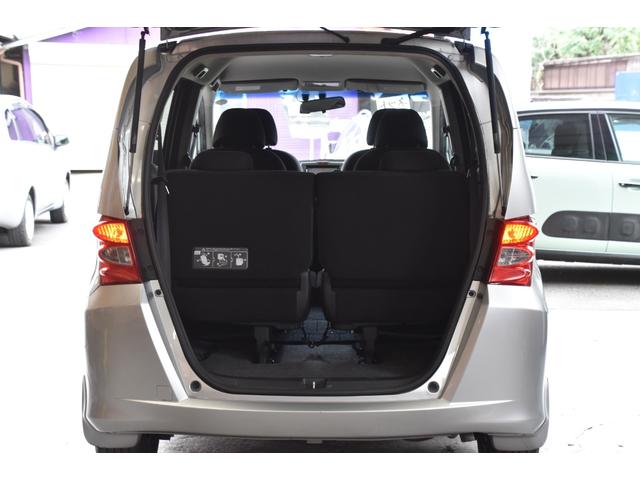 フリード Ｇ　ジャストセレクション　車検令和８年６月２１日　キーレス　ＥＴＣ　左パワスラ　純ＨＤＤナビ　地デジワンセグ　Ｂカメラ　ナビキャンセラー　オートライト　ウインカーミラー（26枚目）