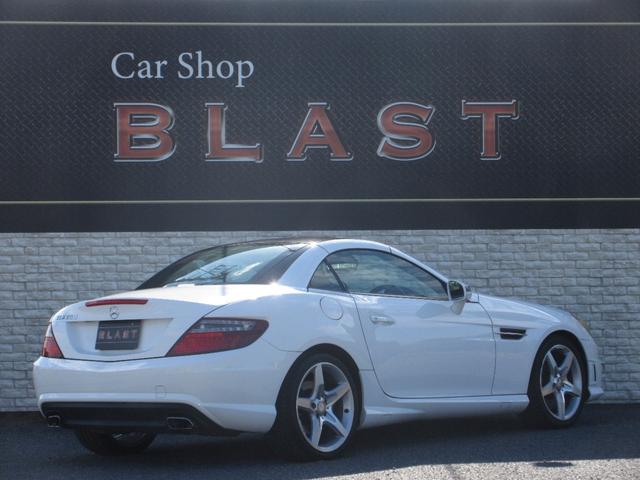 ＳＬＫ ＳＬＫ２００ＭＴ　ＡＭＧスポーツパッケージ　６速マニュアル　電動オープン　オートクルコン　純正ＨＤＤナビ　フルセグＴＶ　Ｂｌｕｅｔｏｏｔｈ　ＭＳＶ　本革シート　シートヒーター　オートライト　エアスカーフ　ＥＴＣ　横滑り防止　純正１８ＡＷ（5枚目）