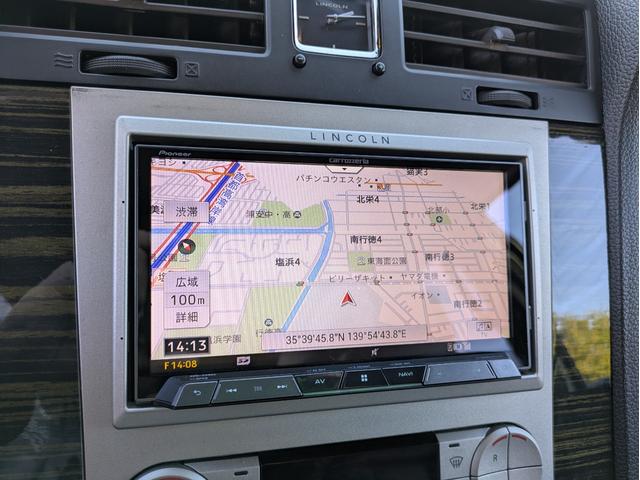 リンカーンナビゲーター ベースグレード　ディーラー車・８ナンバー・車椅子移動車登録・社外ナビ・フルセグ・ＡＬＰＩＮＥフリップダウンモニター・ＥＴＣ・キーレス・パワーバックドア・バックカメラ・フロントカメラ・右サイドカメラ・パワーシート（32枚目）