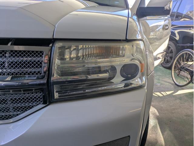 リンカーンナビゲーター ベースグレード　ディーラー車・８ナンバー・車椅子移動車登録・社外ナビ・フルセグ・ＡＬＰＩＮＥフリップダウンモニター・ＥＴＣ・キーレス・パワーバックドア・バックカメラ・フロントカメラ・右サイドカメラ・パワーシート（58枚目）