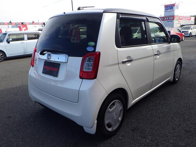 Ｎ－ＯＮＥ Ｇ・Ｌパッケージ　１年保証付　純正ナビ　バックカメラ　ＣＤ再生　ラジオ　ＨＩＤヘッドライト　オートライト　ステアリングスイッチ　スマートキー　プッシュスタート　電動格納ミラー　オートエアコン　バニティミラー　２トーン車（7枚目）