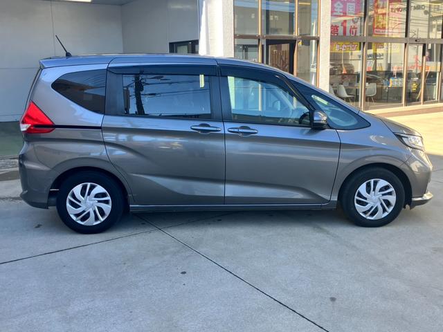 フリード G・ホンダセンシング 7人乗☆純正ナビ☆バックカメラ☆ETC☆ドライブレコーダー☆フリップダウンモニター☆シートヒーター☆クルーズコントロール☆衝突軽減装置☆両側電動スライドドア☆スマートキー☆純正ホイール(61枚目)