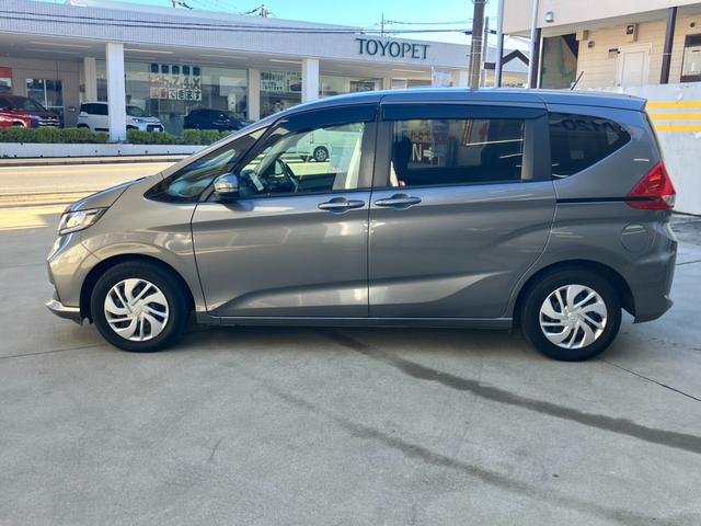 フリード G・ホンダセンシング 7人乗☆純正ナビ☆バックカメラ☆ETC☆ドライブレコーダー☆フリップダウンモニター☆シートヒーター☆クルーズコントロール☆衝突軽減装置☆両側電動スライドドア☆スマートキー☆純正ホイール(65枚目)