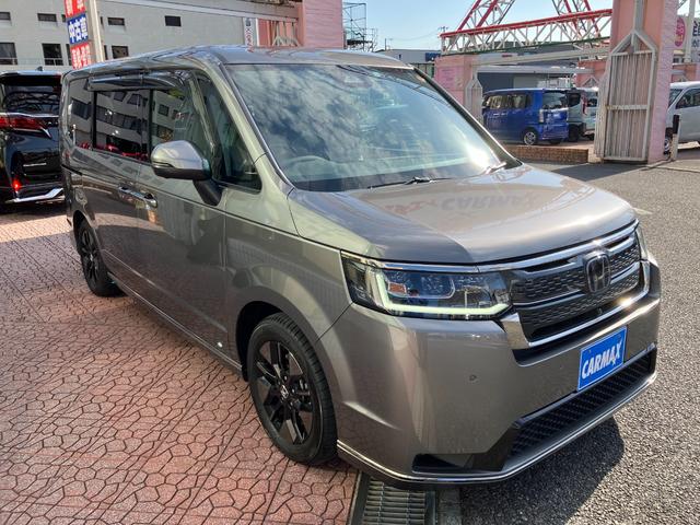 ステップワゴン ｅ：ＨＥＶスパーダ　フリップダウンモニター　マルチビューカメラ　純正ナビ　ＴＶ　スマートキー　ドラレコ　電動リアゲート　レーダークルコン　ＥＴＣ　クリアランスソナー　レーンアシスト　衝突被害軽減　ＬＥＤ　シートヒーター（16枚目）