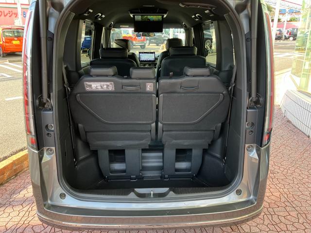 ステップワゴン ｅ：ＨＥＶスパーダ　フリップダウンモニター　マルチビューカメラ　純正ナビ　ＴＶ　スマートキー　ドラレコ　電動リアゲート　レーダークルコン　ＥＴＣ　クリアランスソナー　レーンアシスト　衝突被害軽減　ＬＥＤ　シートヒーター（21枚目）