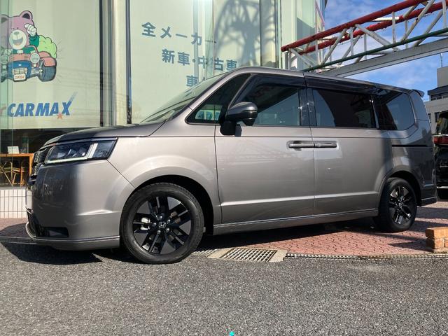 ステップワゴン ｅ：ＨＥＶスパーダ　フリップダウンモニター　マルチビューカメラ　純正ナビ　ＴＶ　スマートキー　ドラレコ　電動リアゲート　レーダークルコン　ＥＴＣ　クリアランスソナー　レーンアシスト　衝突被害軽減　ＬＥＤ　シートヒーター（25枚目）