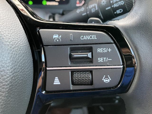 ステップワゴン e:HEVスパーダ マルチビューカメラ フリップダウンモニター 純正ナビ TV スマートキー BSM ETC レーダークルコン クリアランスソナー レーンアシスト 衝突被害軽減 LED 電動リアゲート 前席シートヒーター(14枚目)