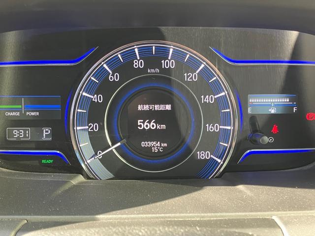 オデッセイハイブリッド ハイブリッドアブソルート・ホンダセンシング　マルチビューカメラシステム　大型アームレスト　フリップダウンモニター　純正ナビ　ＴＶ　センターコンソールボックス　前後ドラレコ　クリアランスソナ　レーダークルコン　パークアシスト　衝突被害軽減　ＥＴＣ（8枚目）