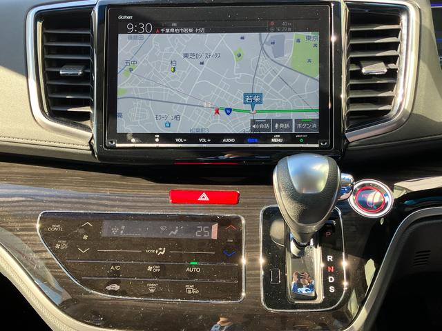 オデッセイハイブリッド ハイブリッドアブソルート・ホンダセンシング　マルチビューカメラシステム　大型アームレスト　フリップダウンモニター　純正ナビ　ＴＶ　センターコンソールボックス　前後ドラレコ　クリアランスソナ　レーダークルコン　パークアシスト　衝突被害軽減　ＥＴＣ（9枚目）