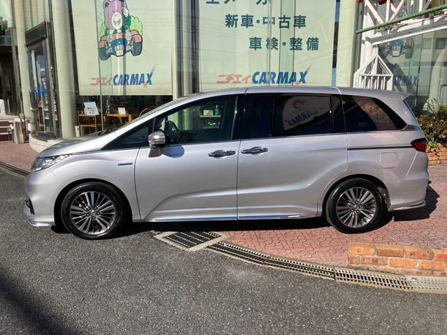 オデッセイハイブリッド ハイブリッドアブソルート・ホンダセンシング　マルチビューカメラシステム　大型アームレスト　フリップダウンモニター　純正ナビ　ＴＶ　センターコンソールボックス　前後ドラレコ　クリアランスソナ　レーダークルコン　パークアシスト　衝突被害軽減　ＥＴＣ（24枚目）