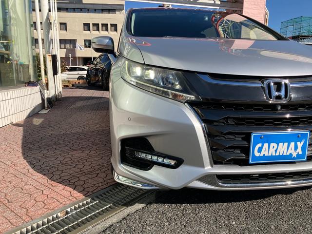 オデッセイハイブリッド ハイブリッドアブソルート・ホンダセンシング　マルチビューカメラシステム　大型アームレスト　フリップダウンモニター　純正ナビ　ＴＶ　センターコンソールボックス　前後ドラレコ　クリアランスソナ　レーダークルコン　パークアシスト　衝突被害軽減　ＥＴＣ（26枚目）