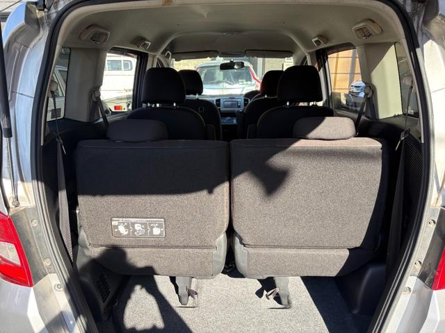 フリード Ｇ　ハイウェイエディション　純正７インチナビ　片側パワースライドドア　Ｂカメラ　ワンセグナビ　ＣＤ／ＤＶＤ再生　取説　スペアキー　マット　純正バイザー　オートエアコン　７人乗り　ヨコハマ８分山タイヤ　跳ね上げ３列目シート（57枚目）