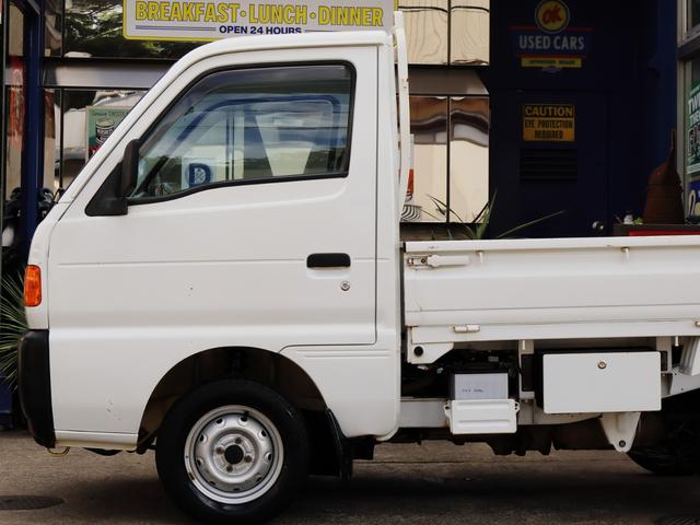 キャリイトラック キンタロウWA 金太郎ダンプ4WD 5速+EL パートタイム4WD(後輪駆動ベース) NEWタイヤ装着 取説記録簿 検令和8年9月 ドアバイザー サイドシルスカッフ リヤゲートチェーン デフロック アクセルロック(14枚目)