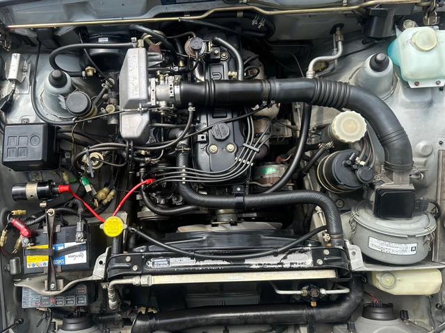 ピアッツァ ＸＬ　純正５速　ＪＲ１３０　走行６４０００キロ　修復歴無し　セミリトラクタブルライト　アルミホイール　エアコン　５ＭＴ　マニュアル車（16枚目）