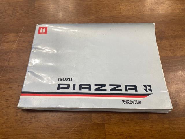 ピアッツァ ＸＬ　純正５速　ＪＲ１３０　走行６４０００キロ　修復歴無し　セミリトラクタブルライト　アルミホイール　エアコン　５ＭＴ　マニュアル車（48枚目）