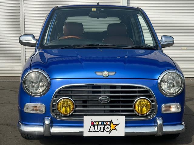 ミラジーノ ミニライトスペシャルターボ　純正５速　Ｌ７００Ｓ　ｍｏｍｏステアリング　キーレス　Ｂｌｕｅｔｏｏｔｈ接続　電動格納ミラー　ＣＤ・ラジオ再生　ミニライト１４インチアルミホイール　フロントフォグランプ　　ＨＩＤヘッドライト　５ＭＴ（5枚目）
