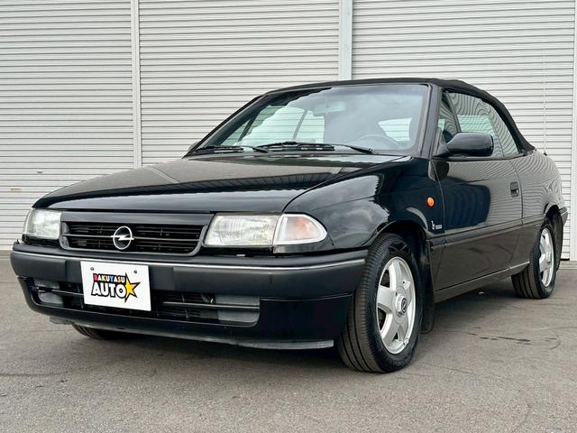 アストラ カブリオ　左ハンドル　走行５２０００キロ　修復歴無し　ディーラー車　１４インチアルミホイール　リアフォグランプ　ナビ（12枚目）