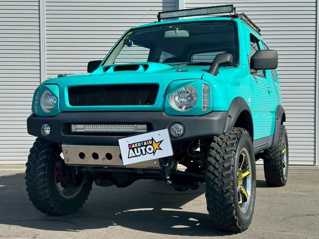 ジムニー ＸＡ　４ＷＤ　ターボ　ＪＢ２３Ｗ　タイミングチェーン　１６インチアルミホイール　フロントフォグランプ　リフトアップ　ＥＴＣ　ＤＶＤ・ＣＤ再生　ナビ付き（9枚目）