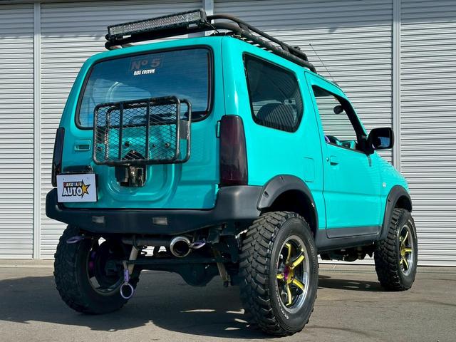 ジムニー ＸＡ　４ＷＤ　ターボ　ＪＢ２３Ｗ　タイミングチェーン　１６インチアルミホイール　フロントフォグランプ　リフトアップ　ＥＴＣ　ＤＶＤ・ＣＤ再生　ナビ付き（12枚目）