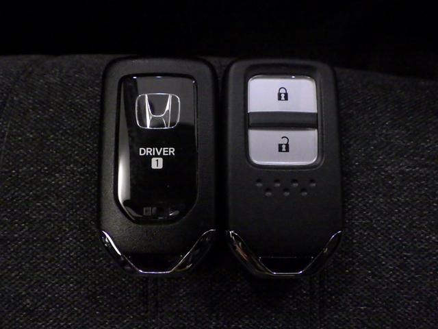 フィット e:HEVホーム 禁煙 元試乗車 センシング6SRS 9インチコネクトナビ リアカメラ フルセグ ミュージックラック Bluetoothオーディオ USB SD LED ETC 前後誤発進抑制機能 助手席エアバッグ(6枚目)