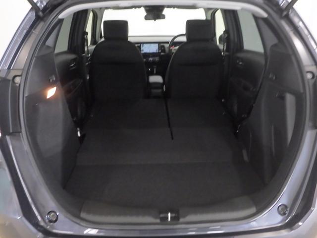 フィット e:HEVホーム 禁煙 元試乗車 センシング6SRS 9インチコネクトナビ リアカメラ フルセグ ミュージックラック Bluetoothオーディオ USB SD LED ETC 前後誤発進抑制機能 助手席エアバッグ(20枚目)