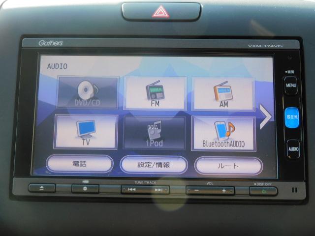 フリード G 禁煙車 Bluetooth対応 純正メモリーナビ フルセグ DVD/CD ETC リアカメラ VSA スマートキー 左側電動スライドドア 片側電動両側スライドドア 記録簿 3列シート パワーウインドウ(3枚目)