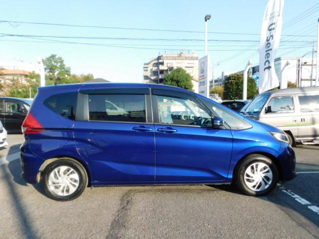 フリード G 禁煙車 Bluetooth対応 純正メモリーナビ フルセグ DVD/CD ETC リアカメラ VSA スマートキー 左側電動スライドドア 片側電動両側スライドドア 記録簿 3列シート パワーウインドウ(8枚目)