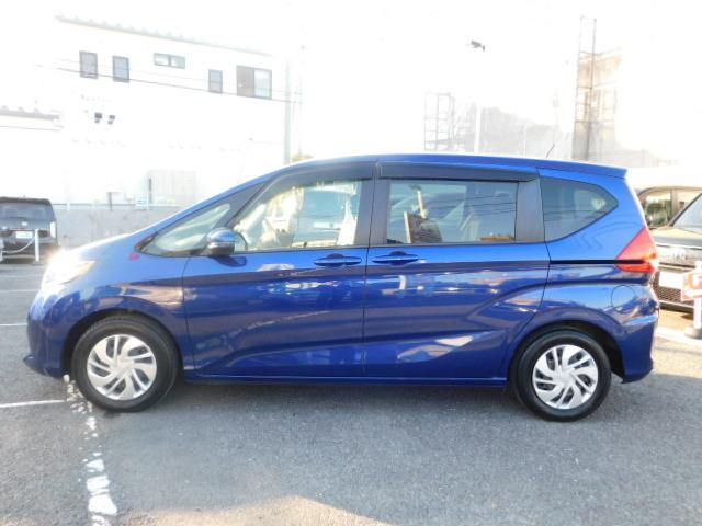 フリード G 禁煙車 Bluetooth対応 純正メモリーナビ フルセグ DVD/CD ETC リアカメラ VSA スマートキー 左側電動スライドドア 片側電動両側スライドドア 記録簿 3列シート パワーウインドウ(9枚目)