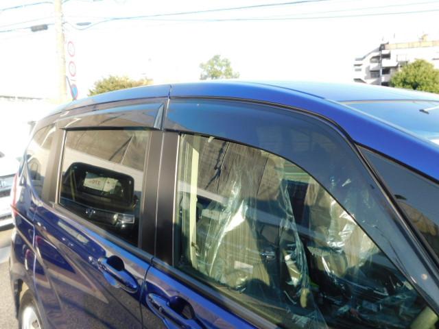 フリード G 禁煙車 Bluetooth対応 純正メモリーナビ フルセグ DVD/CD ETC リアカメラ VSA スマートキー 左側電動スライドドア 片側電動両側スライドドア 記録簿 3列シート パワーウインドウ(12枚目)