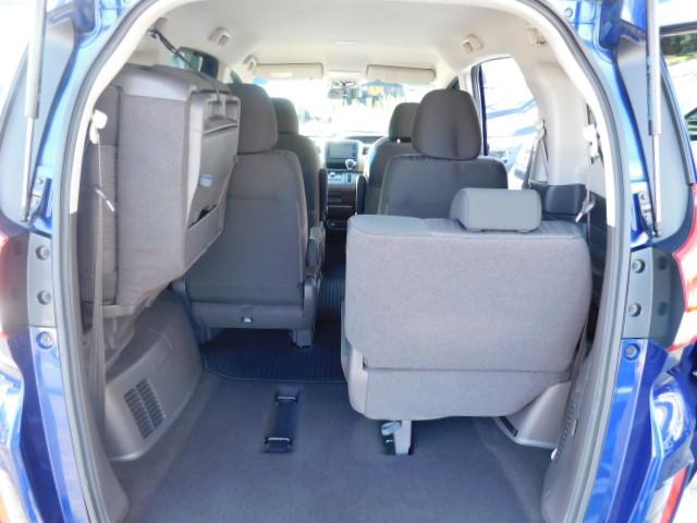 フリード G 禁煙車 Bluetooth対応 純正メモリーナビ フルセグ DVD/CD ETC リアカメラ VSA スマートキー 左側電動スライドドア 片側電動両側スライドドア 記録簿 3列シート パワーウインドウ(19枚目)