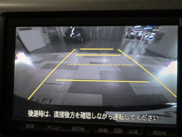 ステップワゴン GHIDエディション 禁煙 工場装着ナビ リアカメラ ワンセグ ミュージックラック USB 天吊モニター HID ETC 両パワスラ ECON キーレス オートエアコン 両側パワースライドドア パワステ Bカメラ ABS(3枚目)