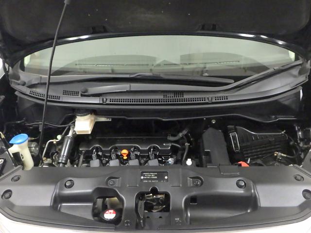 ステップワゴン GHIDエディション 禁煙 工場装着ナビ リアカメラ ワンセグ ミュージックラック USB 天吊モニター HID ETC 両パワスラ ECON キーレス オートエアコン 両側パワースライドドア パワステ Bカメラ ABS(13枚目)