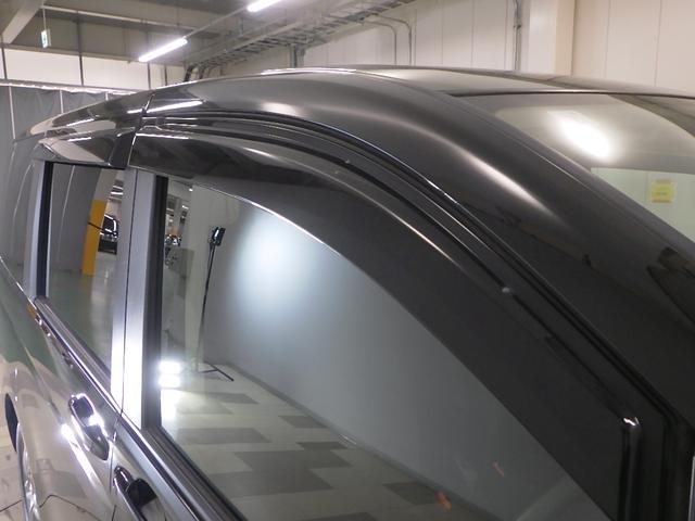 ステップワゴン GHIDエディション 禁煙 工場装着ナビ リアカメラ ワンセグ ミュージックラック USB 天吊モニター HID ETC 両パワスラ ECON キーレス オートエアコン 両側パワースライドドア パワステ Bカメラ ABS(14枚目)