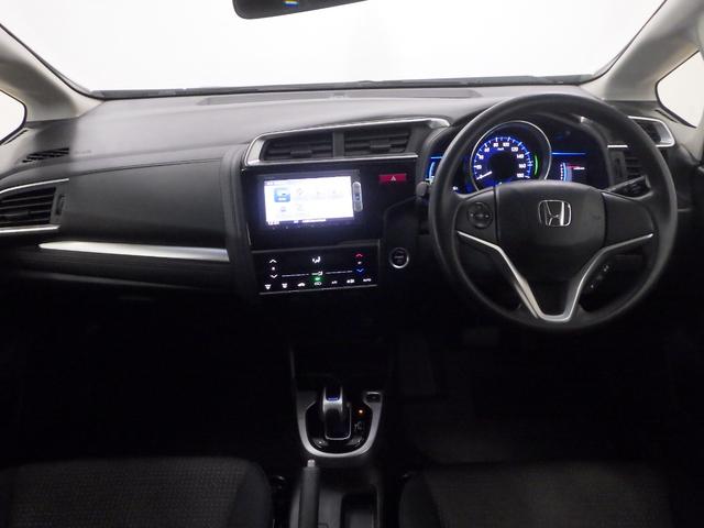 フィットハイブリッド Fパッケージ 禁煙車 あんしんP 純ナビ リアカメラ SD CD/DVD LED ETC ECON VSA 左側面修理しており修復歴車 雹害車 盗難警報装置 ワンオ-ナ-車 記録簿有り AUTOエアコン リヤカメラ(6枚目)