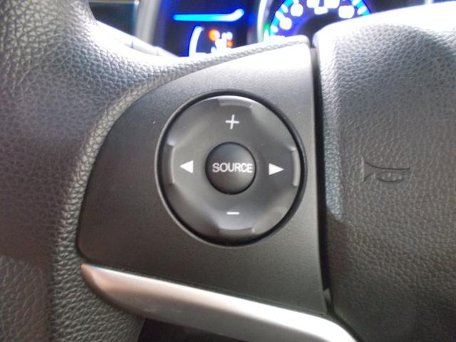 フィットハイブリッド Fパッケージ 禁煙車 あんしんP 純ナビ リアカメラ SD CD/DVD LED ETC ECON VSA 左側面修理しており修復歴車 雹害車 盗難警報装置 ワンオ-ナ-車 記録簿有り AUTOエアコン リヤカメラ(8枚目)