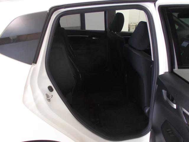 フィットハイブリッド Fパッケージ 禁煙車 あんしんP 純ナビ リアカメラ SD CD/DVD LED ETC ECON VSA 左側面修理しており修復歴車 雹害車 盗難警報装置 ワンオ-ナ-車 記録簿有り AUTOエアコン リヤカメラ(12枚目)