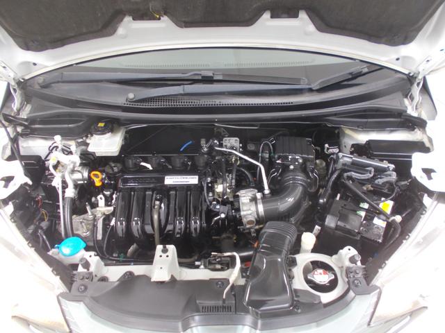 フィットハイブリッド Fパッケージ 禁煙車 あんしんP 純ナビ リアカメラ SD CD/DVD LED ETC ECON VSA 左側面修理しており修復歴車 雹害車 盗難警報装置 ワンオ-ナ-車 記録簿有り AUTOエアコン リヤカメラ(28枚目)