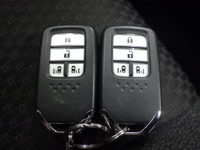 ステップワゴンスパーダ スパーダホンダセンシング 禁煙 ワンオーナ 後席モニター SENSING 衝突軽減ブレーキ 大型ナビ Bluetoothオーディオ アップルカープレイ リアカメラ パドルシフト USB入力 ETC2.0 スマートキー 盗難防止(28枚目)