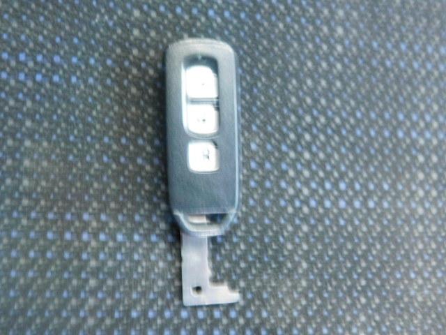 N-BOX G・Lパッケージ 2トーンカラースタイル 禁煙車 メモリーナビ リアカメラ HIDヘッドライト ETC VSA 左側パワースライドドア スマートキー オートリトラミラー 専用14インチホワイトアルミ スペアーキー(25枚目)