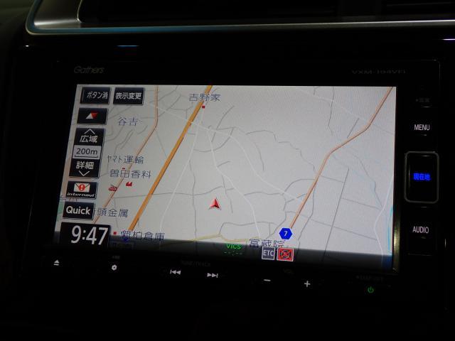 フィットハイブリッド Lホンダセンシング Rカメ 禁煙 LED サイドSRS 横滑り防止 フルセグテレビ 記録簿 ナビTV パワーステアリング 盗難防止装置 オートクルーズ ETC車載器 DVD再生 ABS スマートキー 軽減ブレーキ USB(3枚目)