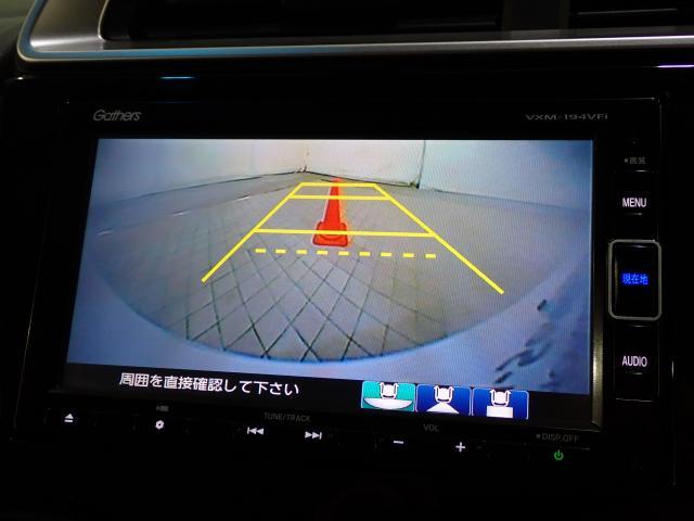 フィットハイブリッド Lホンダセンシング Rカメ 禁煙 LED サイドSRS 横滑り防止 フルセグテレビ 記録簿 ナビTV パワーステアリング 盗難防止装置 オートクルーズ ETC車載器 DVD再生 ABS スマートキー 軽減ブレーキ USB(4枚目)