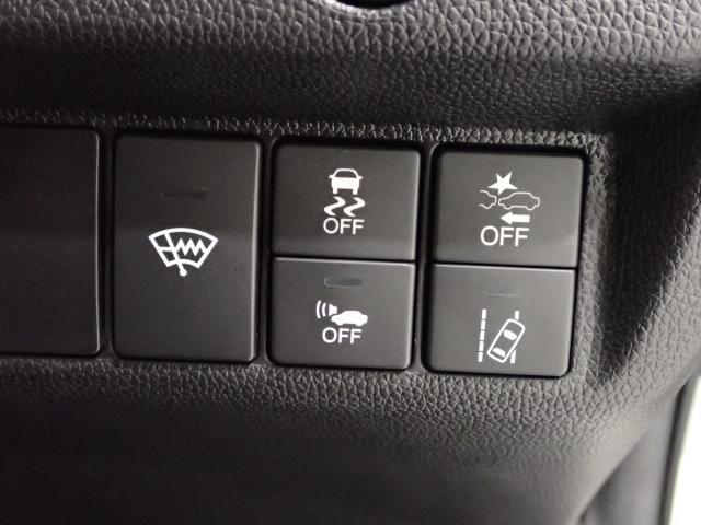 フィットハイブリッド Lホンダセンシング Rカメ 禁煙 LED サイドSRS 横滑り防止 フルセグテレビ 記録簿 ナビTV パワーステアリング 盗難防止装置 オートクルーズ ETC車載器 DVD再生 ABS スマートキー 軽減ブレーキ USB(12枚目)