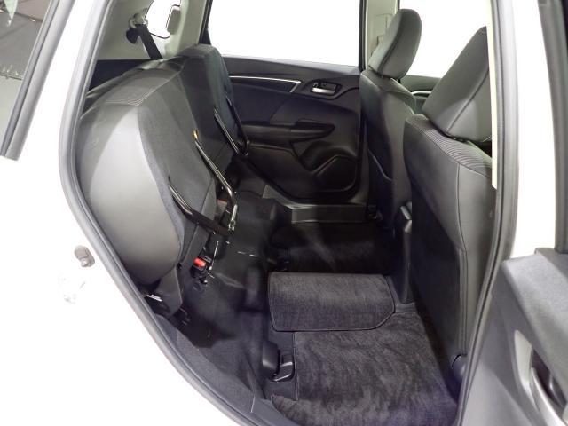 フィットハイブリッド Lホンダセンシング Rカメ 禁煙 LED サイドSRS 横滑り防止 フルセグテレビ 記録簿 ナビTV パワーステアリング 盗難防止装置 オートクルーズ ETC車載器 DVD再生 ABS スマートキー 軽減ブレーキ USB(18枚目)