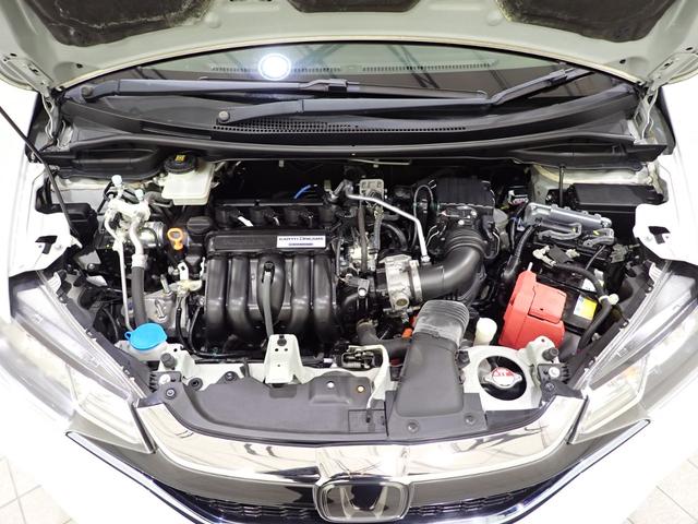 フィットハイブリッド Lホンダセンシング Rカメ 禁煙 LED サイドSRS 横滑り防止 フルセグテレビ 記録簿 ナビTV パワーステアリング 盗難防止装置 オートクルーズ ETC車載器 DVD再生 ABS スマートキー 軽減ブレーキ USB(49枚目)