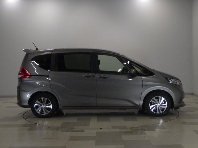 フリードハイブリッド ハイブリッド・Ｇホンダセンシング　禁煙車ホンダセンシング　Ｂｌｕｅｔｏｏｔｈ対応　メモリーナビ　フルセグ　前後ドライブレコーダー　両側Ｐスライドドア　フロントシートヒーター　ＬＥＤ　ＥＴＣ　ＶＳＡ　スマートキー　軽減ブレーキ　ＥＣＯＮ（9枚目）